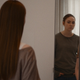 Karen Gillan looking at Karen Gillan in the mirror.
